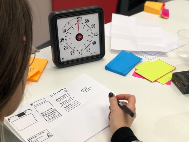 a person sketching research data