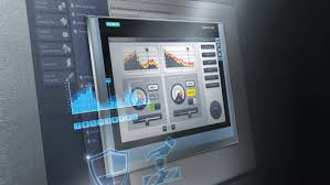 A Siemens SIMATIC HMI panel displays real-time industrial data with interactive graphs and gauges, showcasing precision monitoring and control essential for modern automated manufacturing environments.
