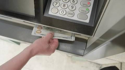 Image showcasing the ATM cash dispensing